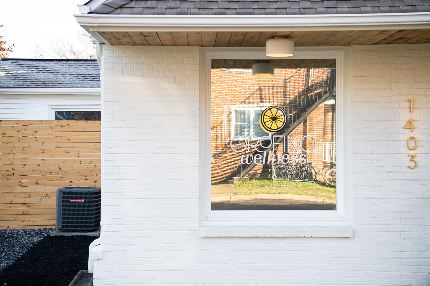 window of Orofino Wellness building with their logo